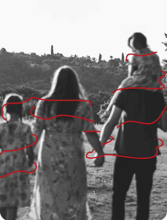 Family walking together away across a natural open horizon